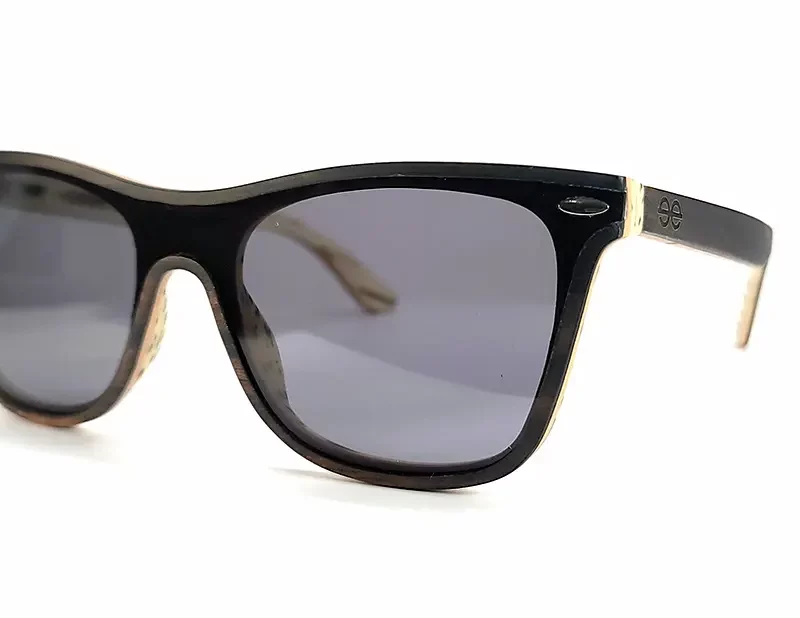 Lunettes de soleil en bois Arrow avec branches fines et design intemporel pour une élégance discrète.