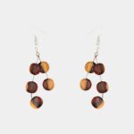 Découvrez la boucles d'oreille en bois bicolore Xénia