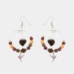 Bijou léger et élégant alliant bois précieux et motif étoile, cœur acajou, et colibri.