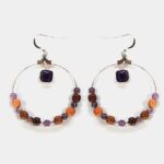 Boucles d'oreilles légères et confortables en bois et améthyste, idéales pour un usage quotidien ou des occasions spéciales.