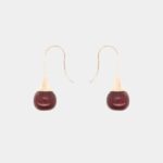 Bijoux Essenciel : boucles d’oreilles élégantes en bois précieux avec finition métal rosé.