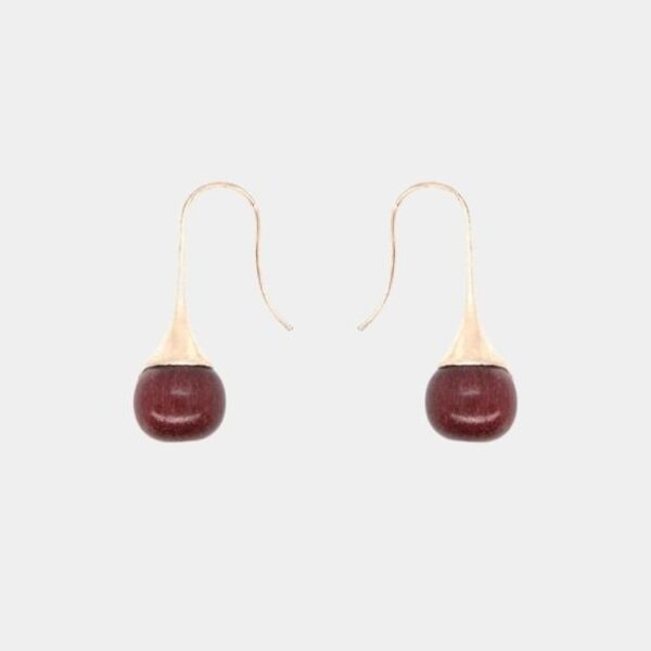 Bijoux Essenciel : boucles d’oreilles élégantes en bois précieux avec finition métal rosé.