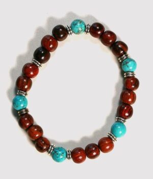 Bracelet en bois d'acajou et turquoise Kenzo : Un bijou élégant avec perles en bois et pierre turquoise.