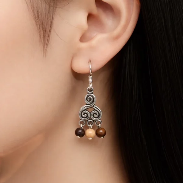 Boucles d'oreilles bois et symbole - Le triskel Linea