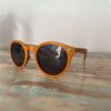 Lunettes de soleil en bois Spector Orange avec monture colorée orange vif, fabriquées à partir de skateboard recyclé, verres polarisés UV400 pour une protection optimale contre les rayons UV, design élégant et durable.